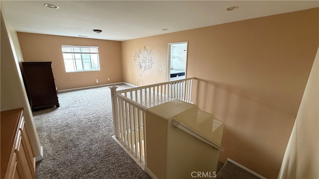 7134 Cumberland Place Rancho Cucamonga, CA 91739 - Photo 9 of 22 a view of entryway with wooden floor