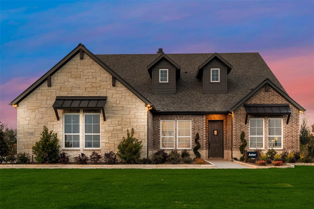250 Brown Road Leonard, TX 75452 - Photo 3 of 29 Stone and brick facade with dark window awnings