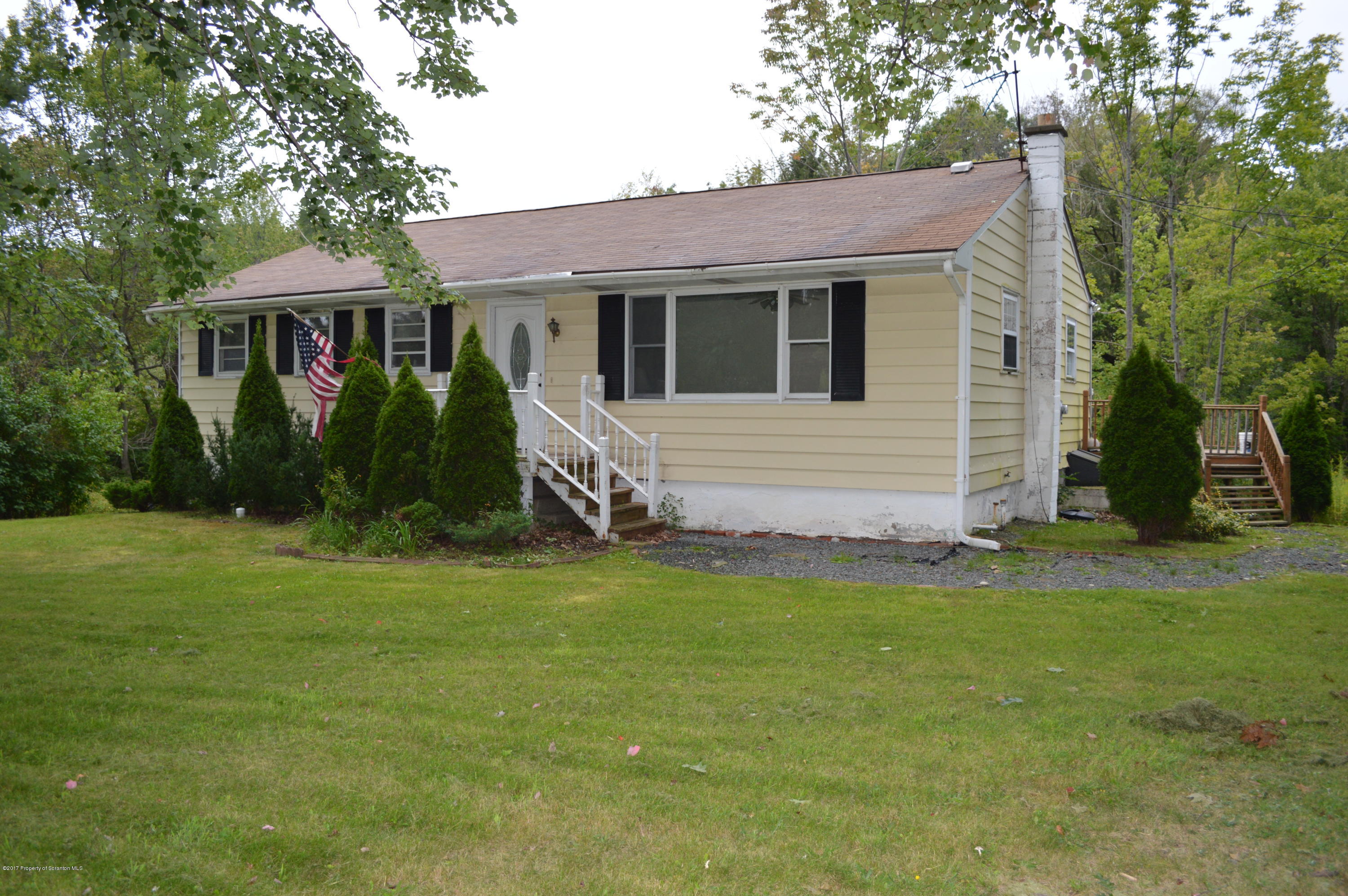 1063 Mt Cobb Road Lake Ariel, PA 18436 - Photo 1 of 20 a view of a house with a backyard