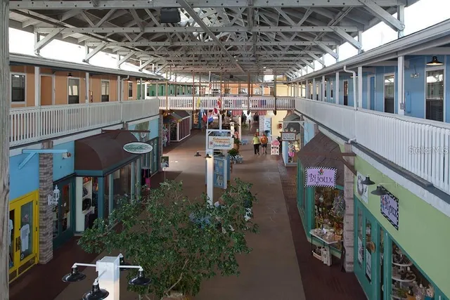 a view of a porch with furniture and a shower