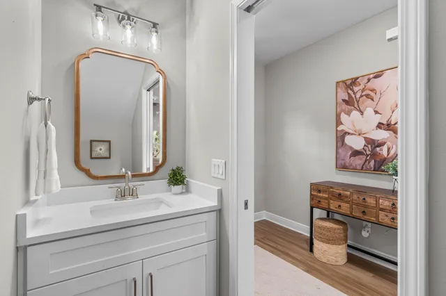 a bathroom with a sink and a mirror