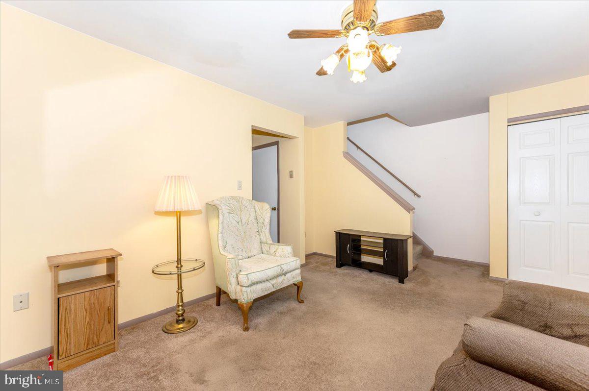 52 Wenner Drive Brunswick, MD 21716 - Photo 13 of 55 a living room with furniture and a fireplace