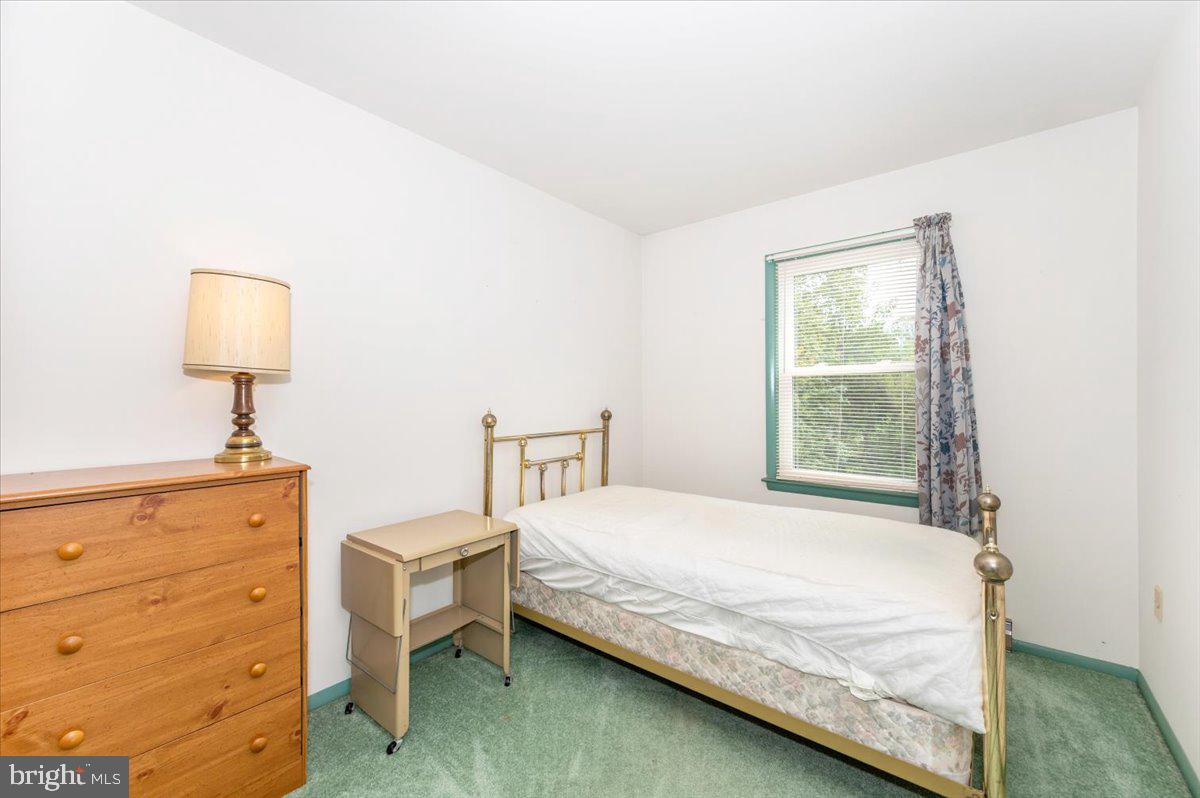 52 Wenner Drive Brunswick, MD 21716 - Photo 33 of 55 a bedroom with a bed and a night stand