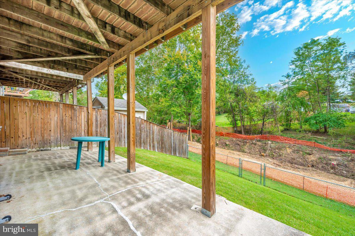 52 Wenner Drive Brunswick, MD 21716 - Photo 49 of 55 a backyard of a house with table and chairs