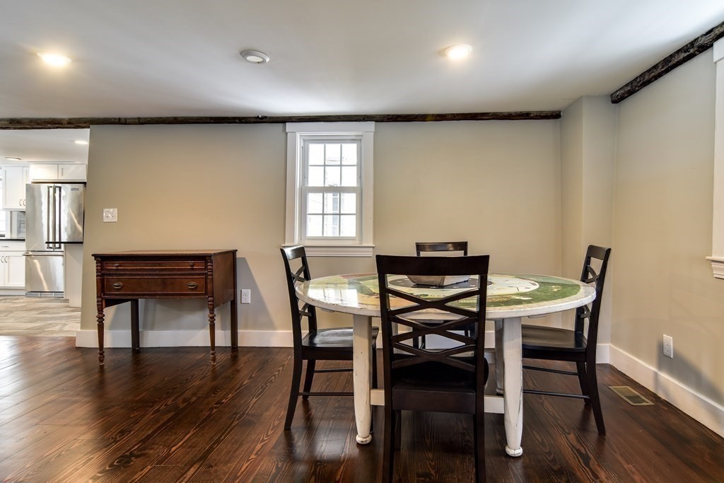 85 Walpole Street Dover, MA 02030 - Photo 15 of 39 a view of a dining room with furniture and wooden floor
