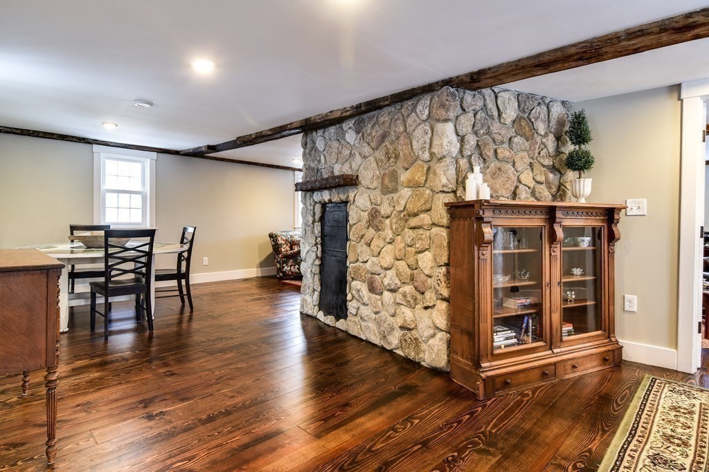 85 Walpole Street Dover, MA 02030 - Photo 18 of 39 an empty room with wooden floor and furniture