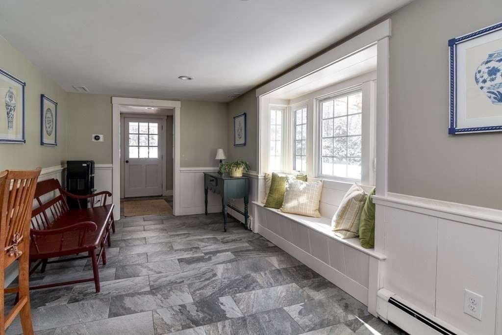 85 Walpole Street Dover, MA 02030 - Photo 21 of 39 a living room with furniture and a gate