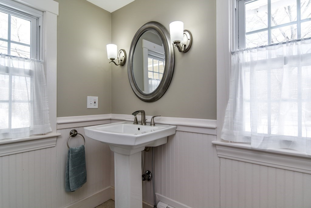 85 Walpole Street Dover, MA 02030 - Photo 31 of 39 a bathroom with a sink and a mirror
