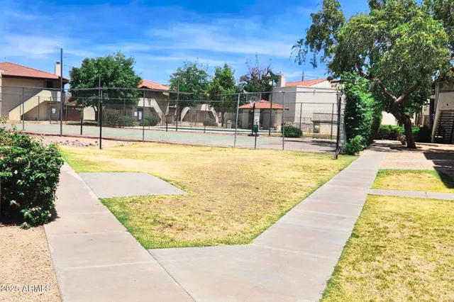 a view of swimming pool with outdoor seating