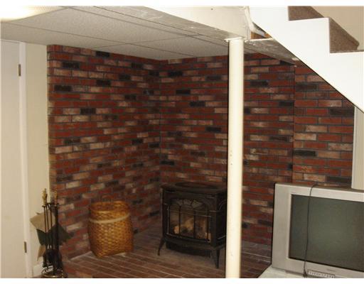 324 Greely Road Cumberland, ME 04021 - Photo 14 of 15 Other. Basement hearth with gas stove