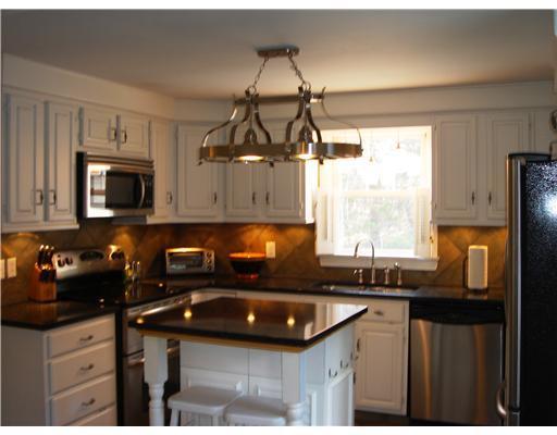 324 Greely Road Cumberland, ME 04021 - Photo 5 of 15 Kitchen. Granite, stainless, and tile