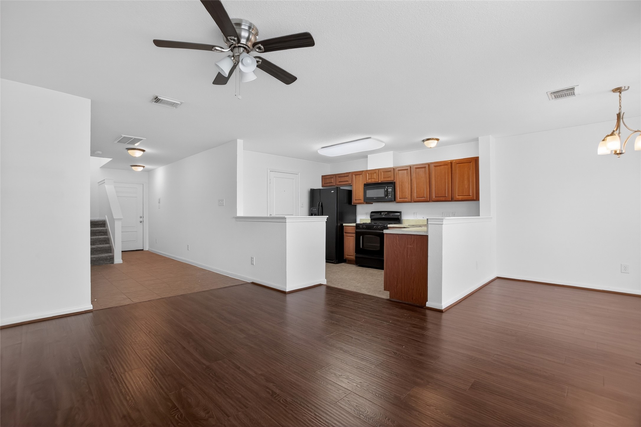 1618 Grable Cove Lane Spring, TX 77379 - Photo 9 of 32 Spacious living room opens to the kitchen and dining area