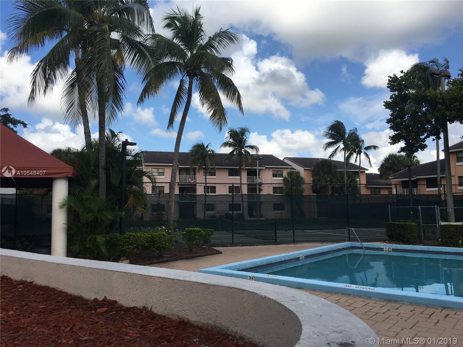7120 Northwest 179th Street, Unit 101 Hialeah, FL 33015 - Photo 2 of 18