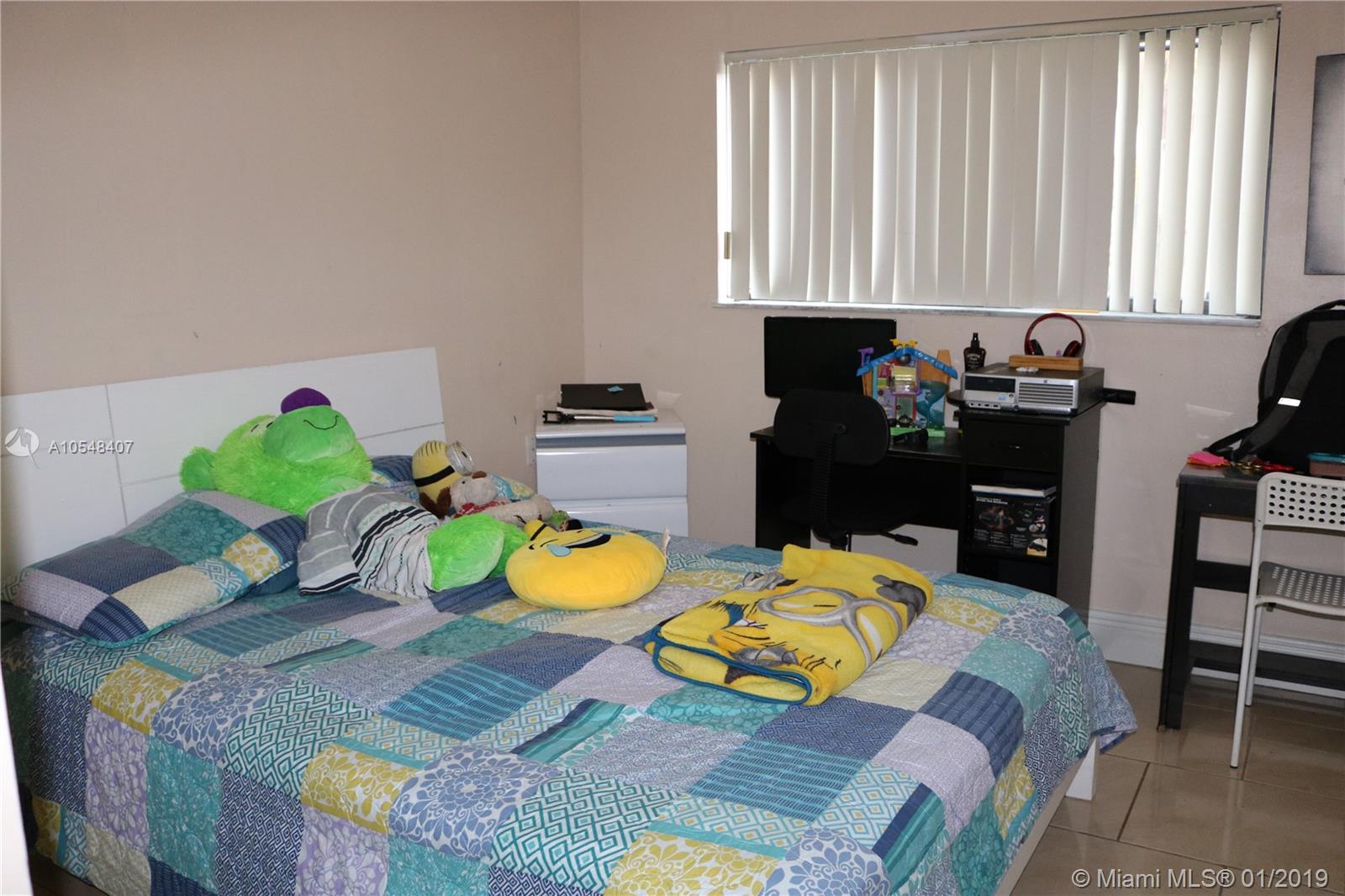 7120 Northwest 179th Street, Unit 101 Hialeah, FL 33015 - Photo 3 of 18