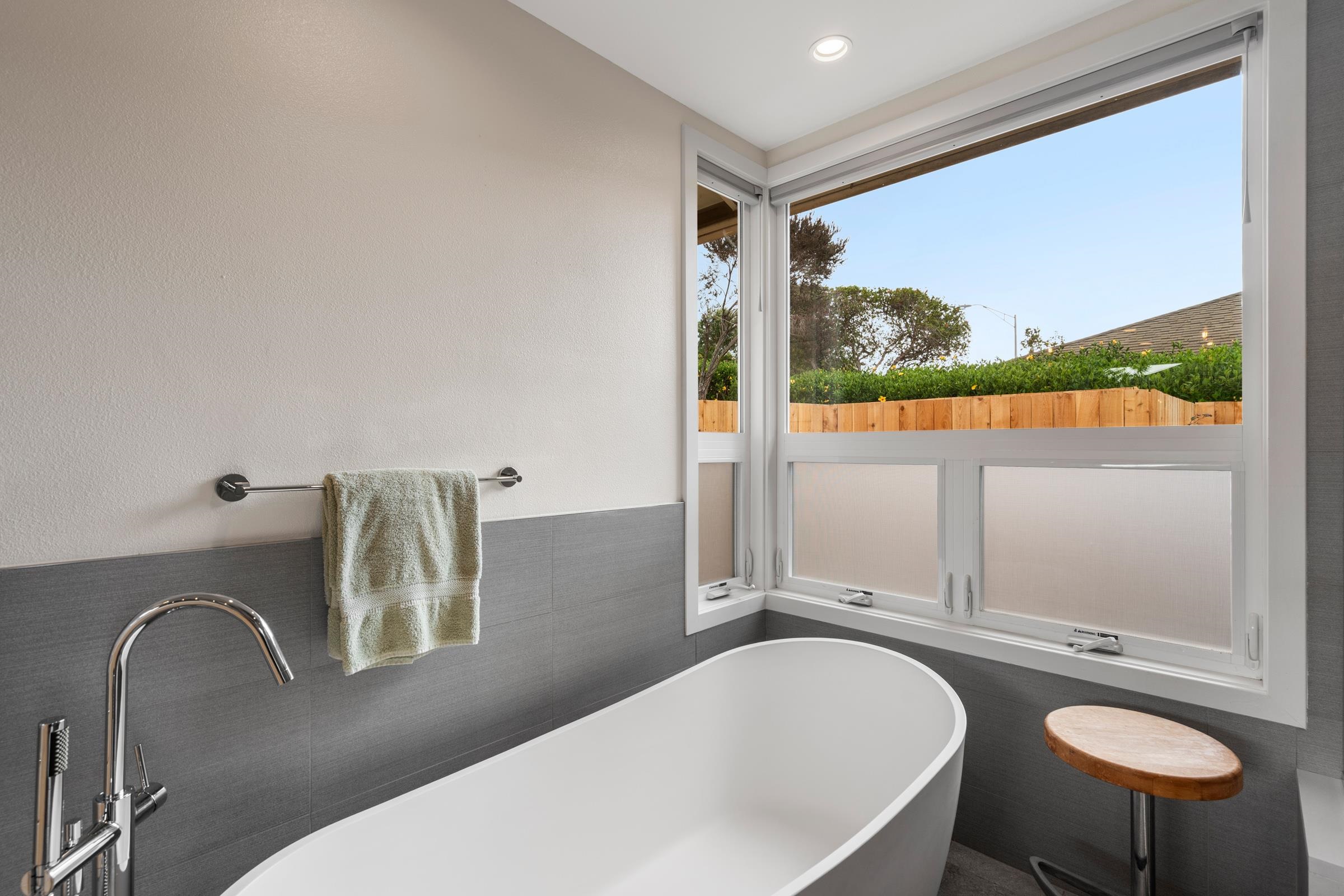 33 U'au Place Kula, HI 96790 - Photo 23 of 50 a bathroom with a granite countertop sink and a large mirror