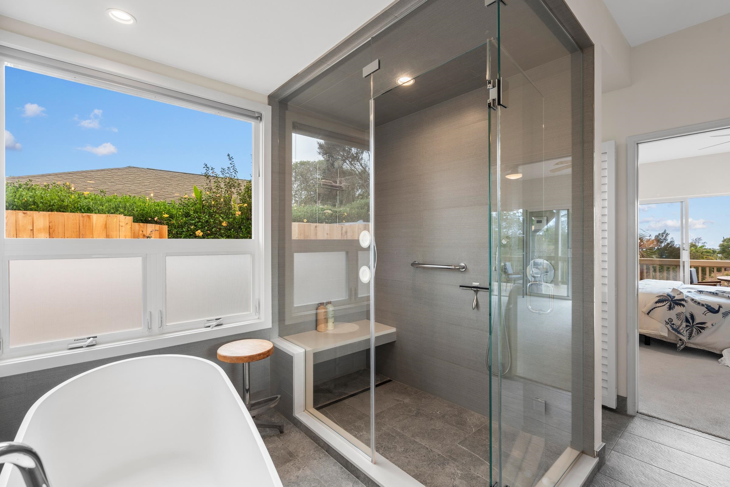 33 U'au Place Kula, HI 96790 - Photo 25 of 50 a bathroom with a tub and shower