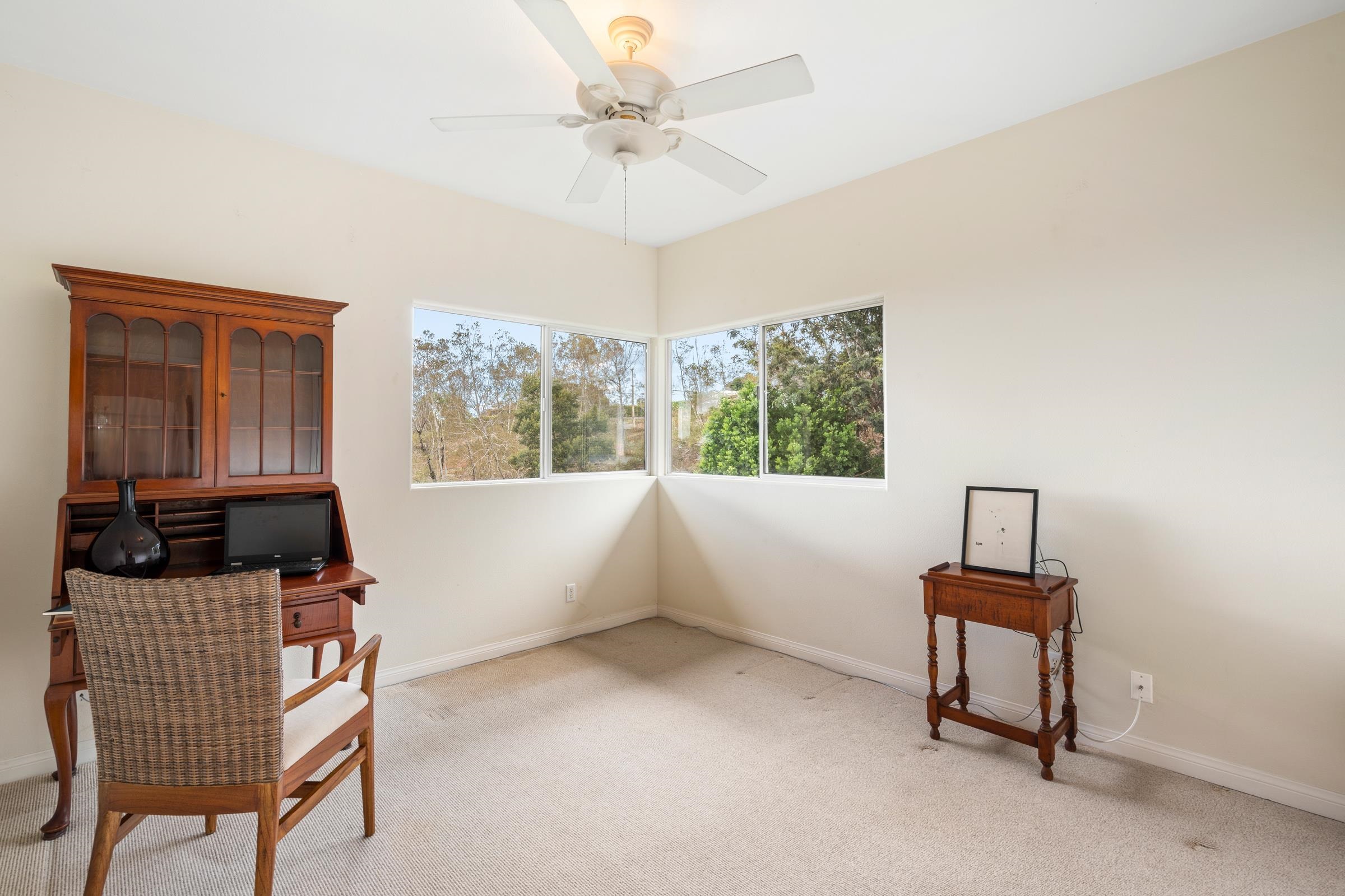 33 U'au Place Kula, HI 96790 - Photo 44 of 50 a bedroom with furniture and a window