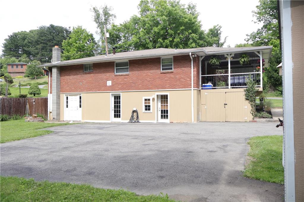 551 Muse-Bishop Road McDonald, PA 15057 - Photo 38 of 38 a front view of a house with a yard and garage