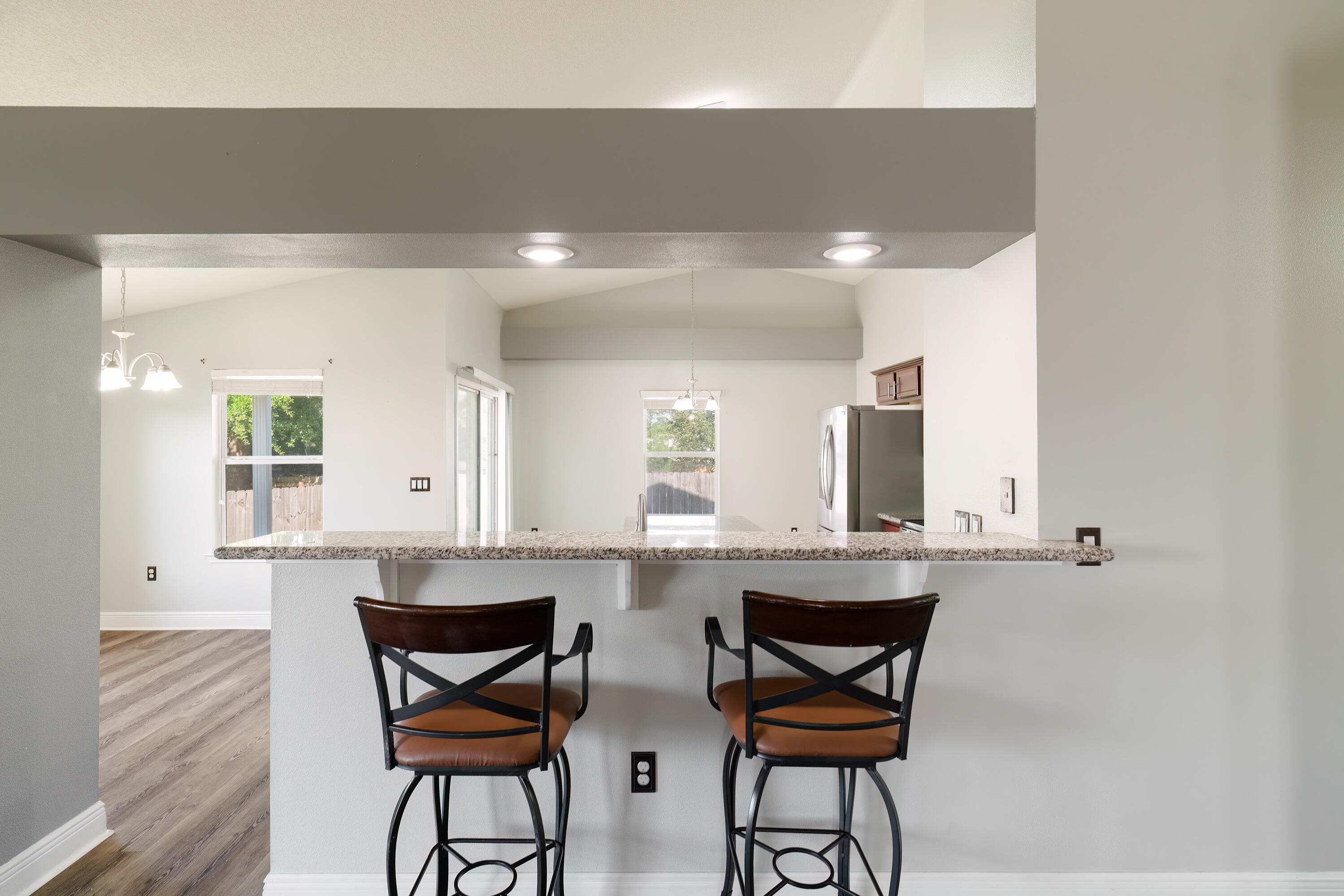 4633 Hermosa Road Crestview, FL 32539 - Photo 13 of 53 a kitchen with a sink cabinets and window