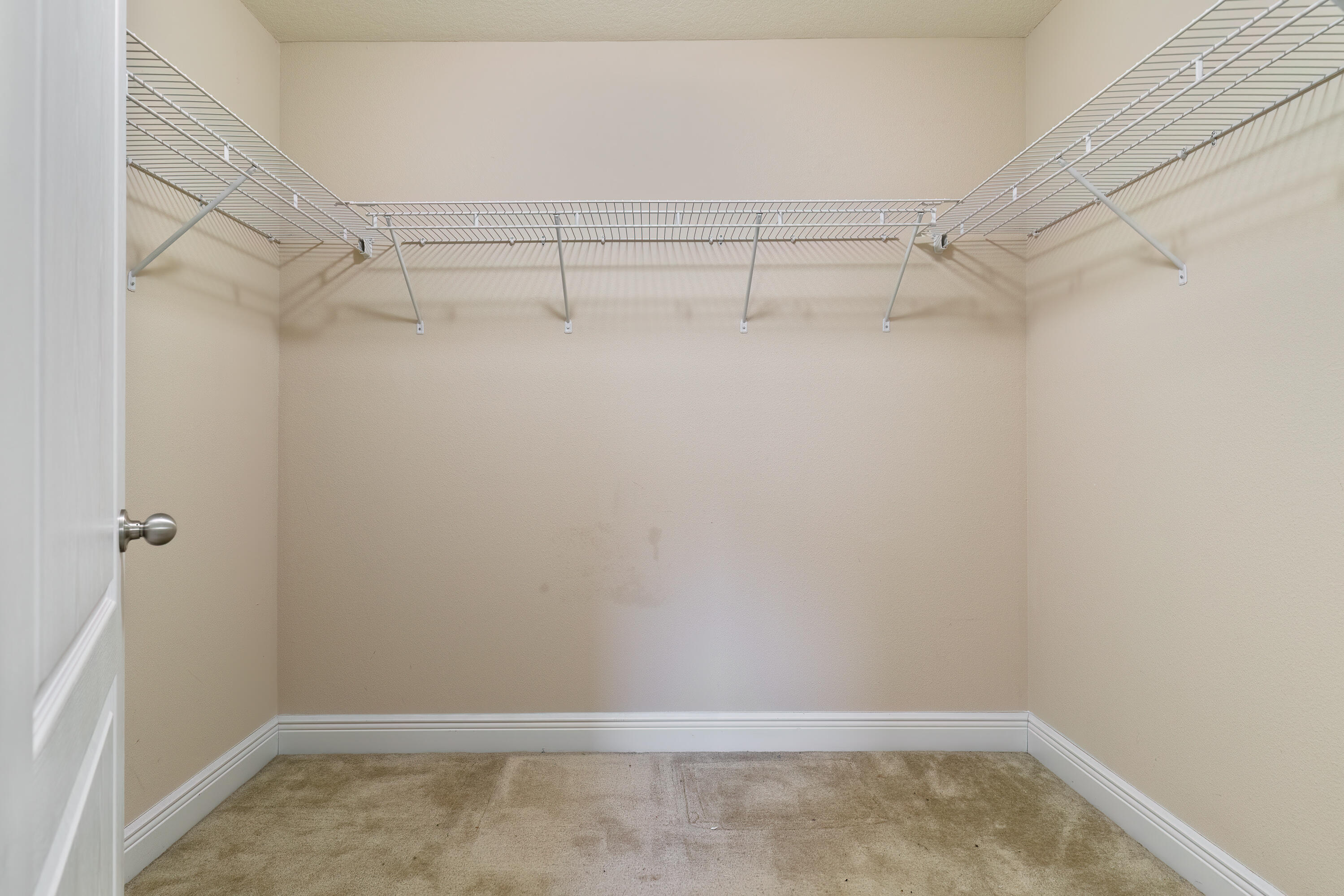 4633 Hermosa Road Crestview, FL 32539 - Photo 32 of 53 a view of an empty walk in closet