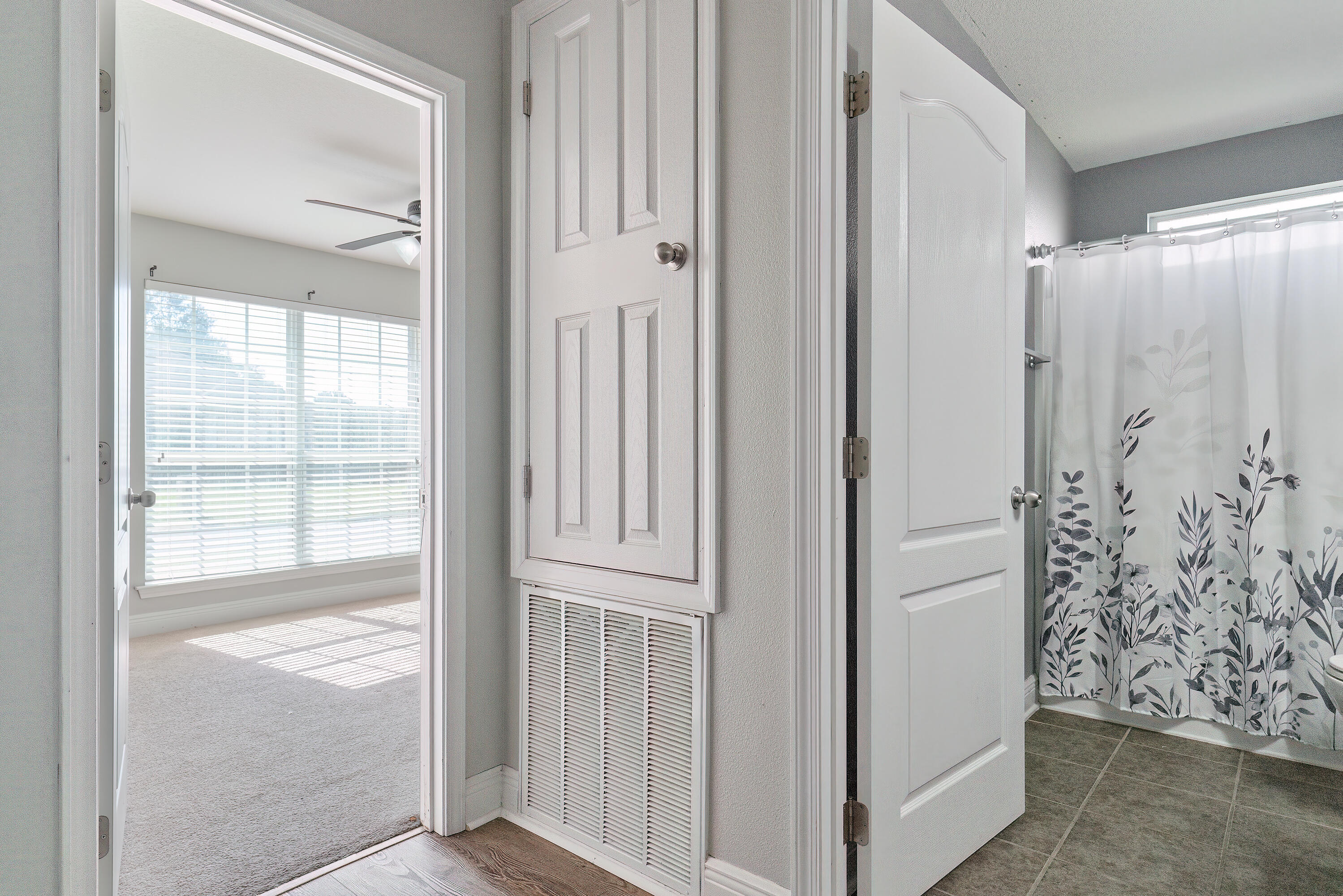 4633 Hermosa Road Crestview, FL 32539 - Photo 35 of 53 a view of a bathroom with a glass door