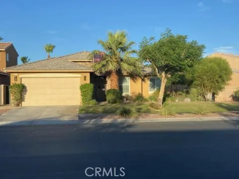 a view of a house with a street