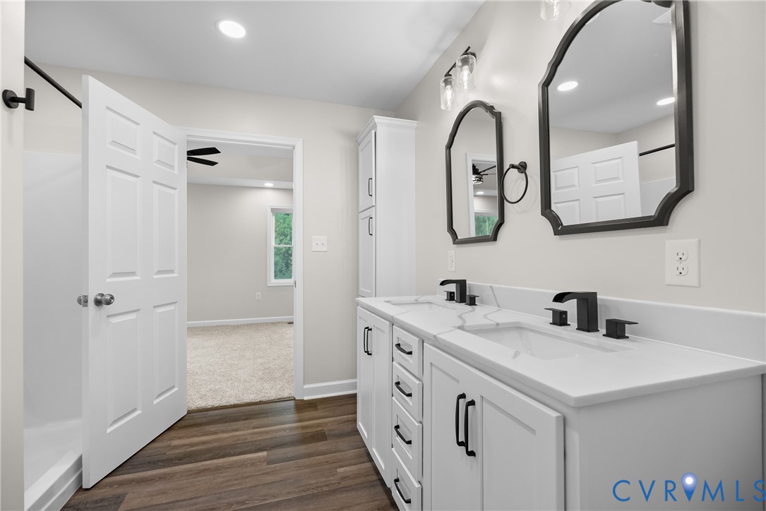 1373 Twenty Two Road Pamplin, VA 23958 - Photo 22 of 39 a bathroom with a sink and a mirror