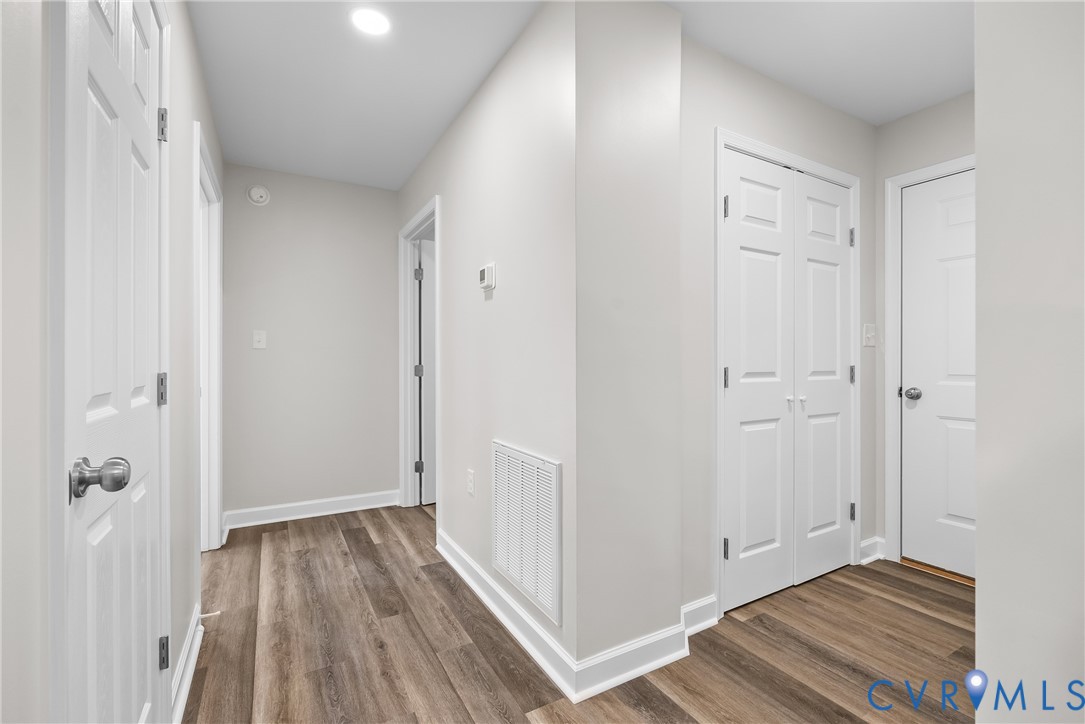 1373 Twenty Two Road Pamplin, VA 23958 - Photo 29 of 39 a view of a hallway with wooden floor