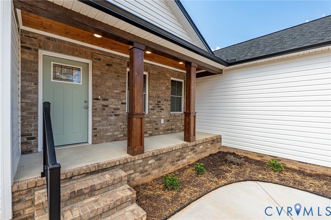 1373 Twenty Two Road Pamplin, VA 23958 - Photo 3 of 39 a view of a porch with a door