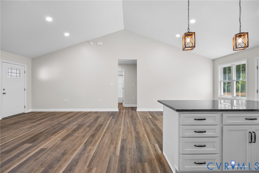 1373 Twenty Two Road Pamplin, VA 23958 - Photo 9 of 39 wooden floor in an empty room with a window
