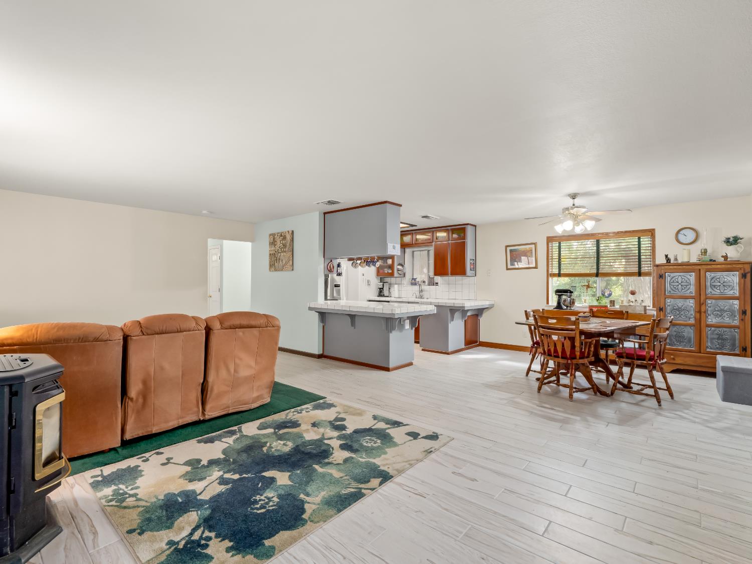 845 Elwood Road Squaw Valley, CA 93675 - Photo 15 of 67 a living room with furniture and wooden floor