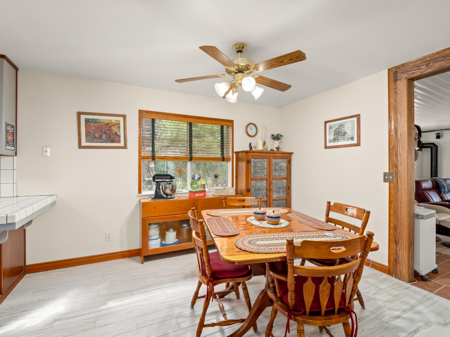 845 Elwood Road Squaw Valley, CA 93675 - Photo 19 of 67 a view of a dining room with furniture window and wooden floor