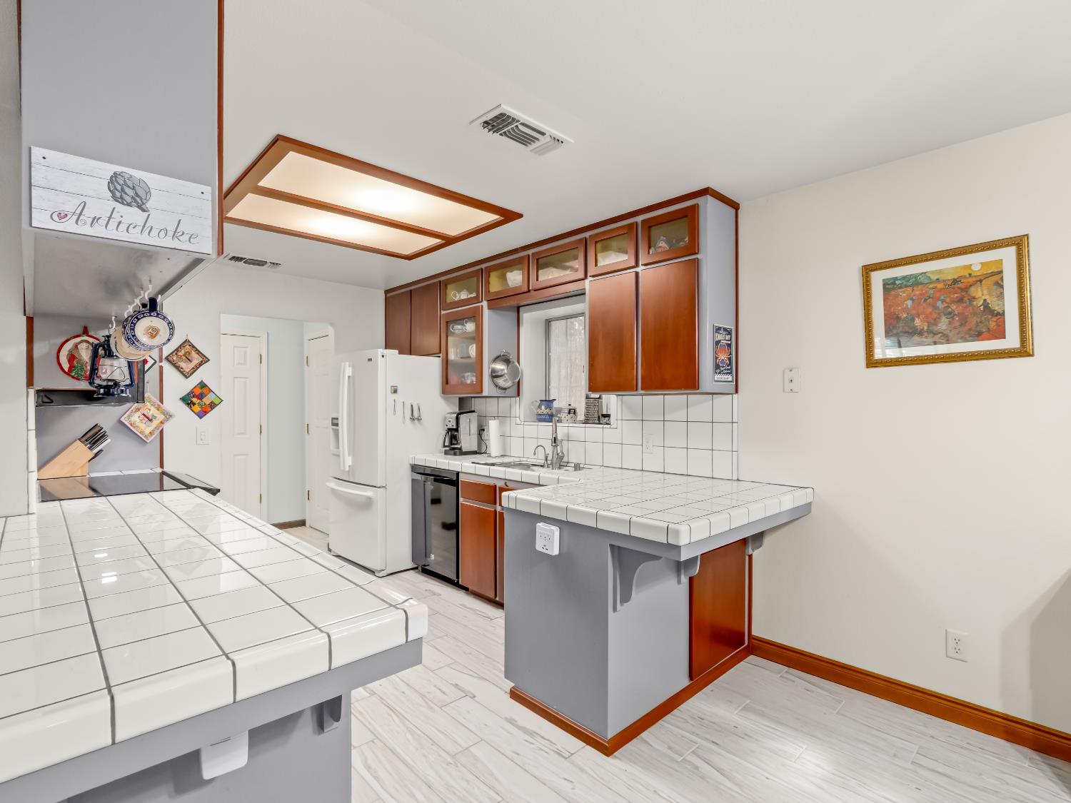 845 Elwood Road Squaw Valley, CA 93675 - Photo 20 of 67 a kitchen with stainless steel appliances granite countertop a sink dishwasher and a stove with wooden floor