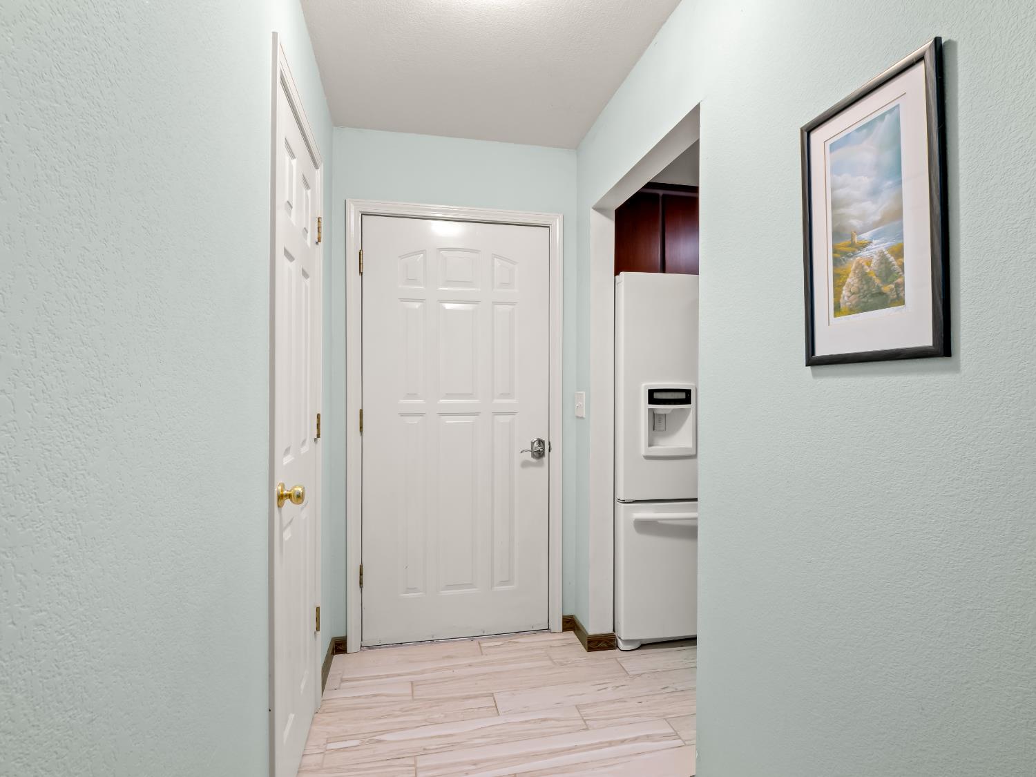 845 Elwood Road Squaw Valley, CA 93675 - Photo 30 of 67 a view of a hallway with wooden floor and closet