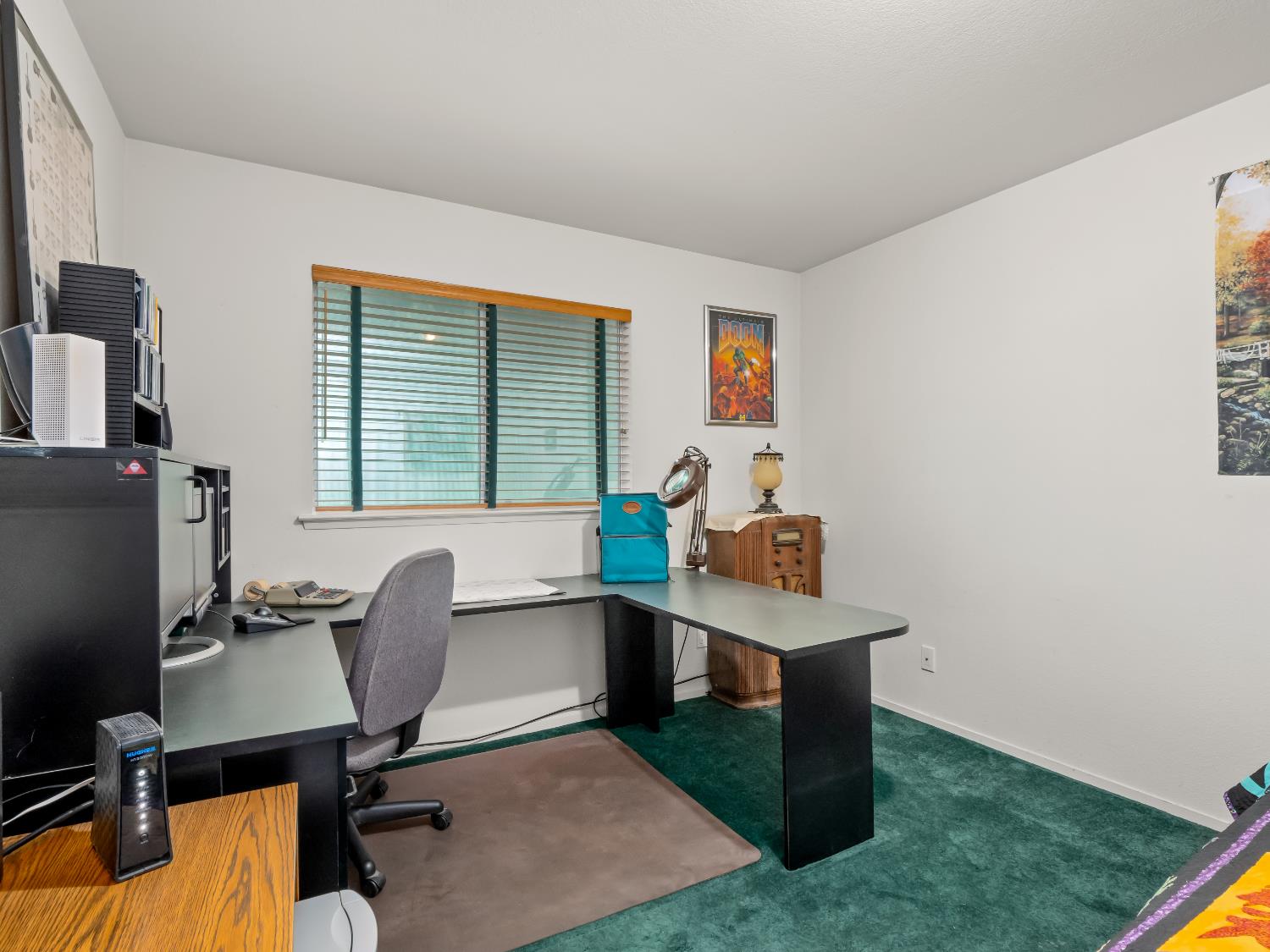 845 Elwood Road Squaw Valley, CA 93675 - Photo 36 of 67 a view of a workspace with furniture and a window