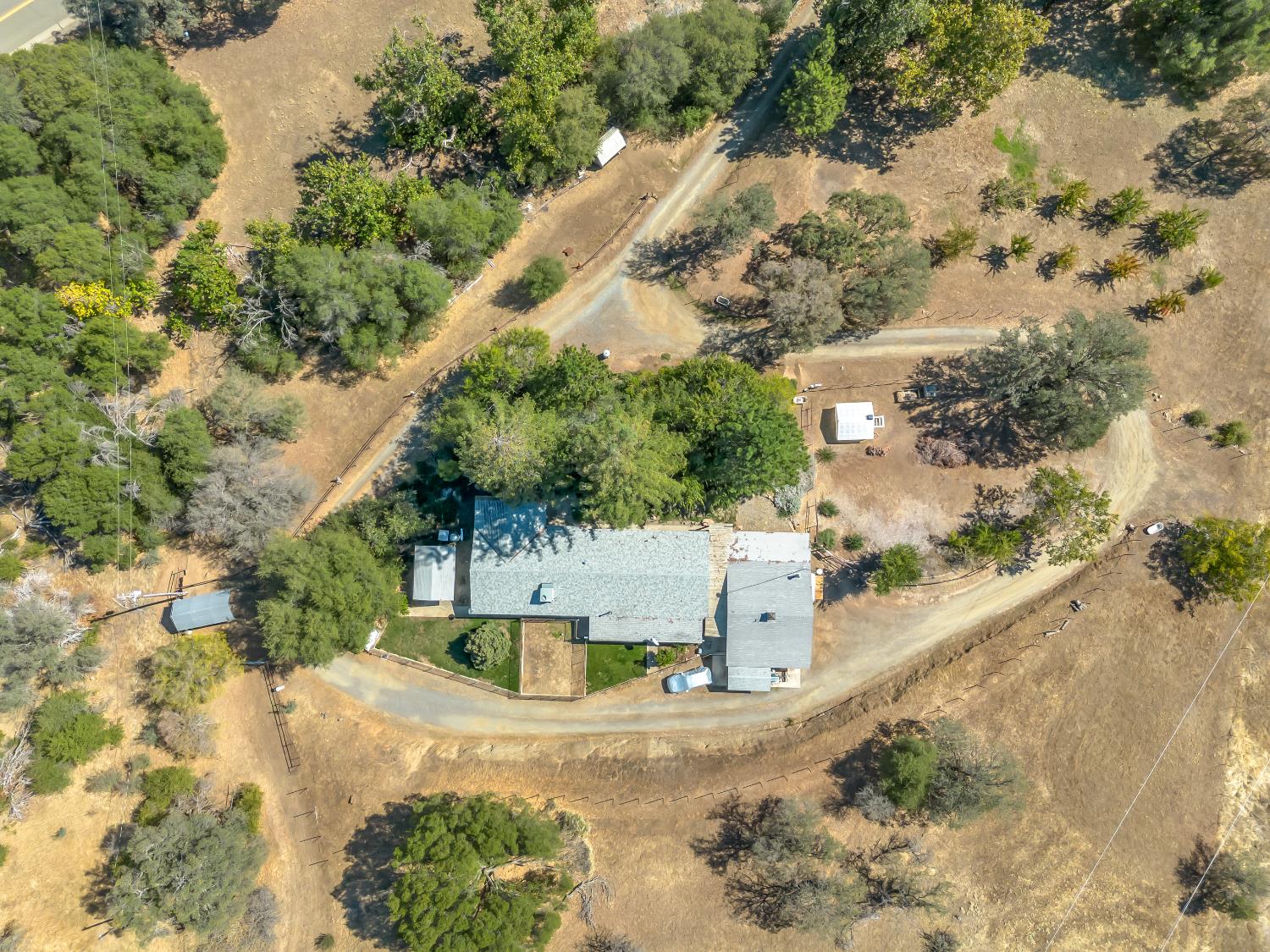 845 Elwood Road Squaw Valley, CA 93675 - Photo 4 of 67 a view of a yard with a fountain