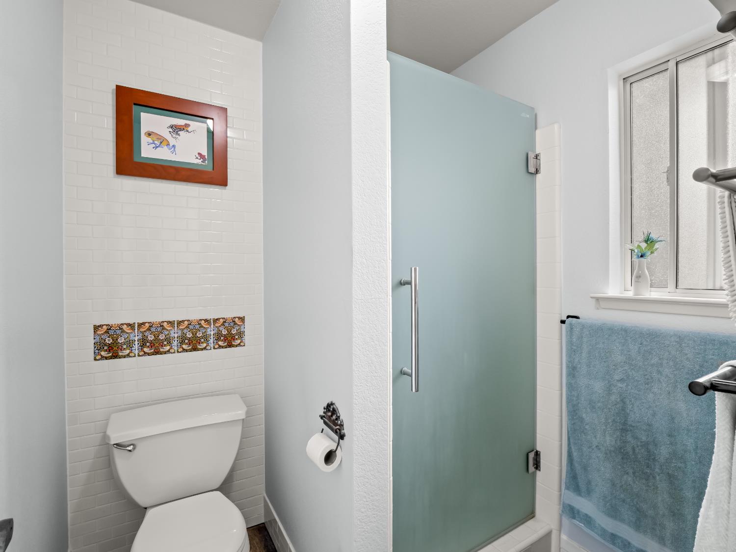 845 Elwood Road Squaw Valley, CA 93675 - Photo 42 of 67 a white toilet sitting next to a bathroom sink