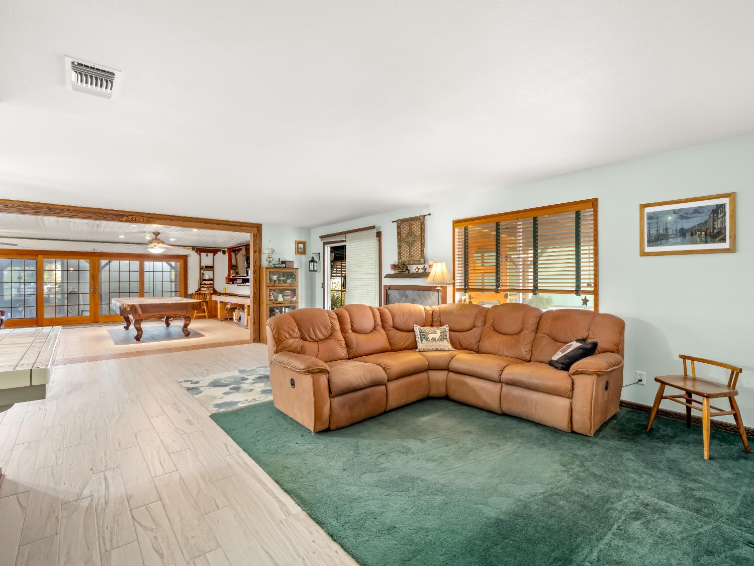 845 Elwood Road Squaw Valley, CA 93675 - Photo 9 of 67 a living room with furniture and a floor to ceiling window