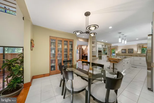 a room with gym equipment and lots of windows