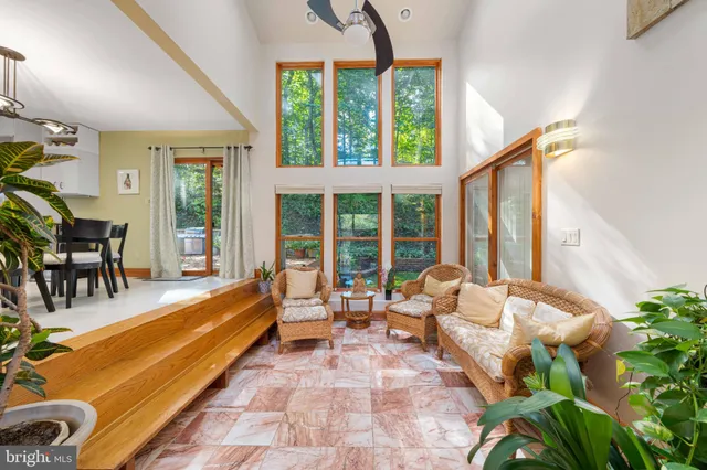 a view of a bathroom with a tub and shower