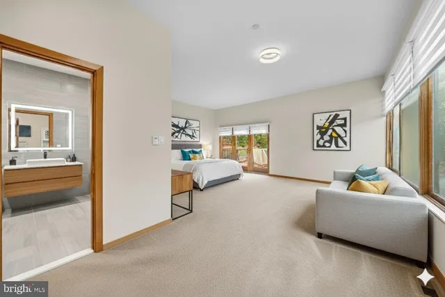 a view of an entryway with wooden floor and windows