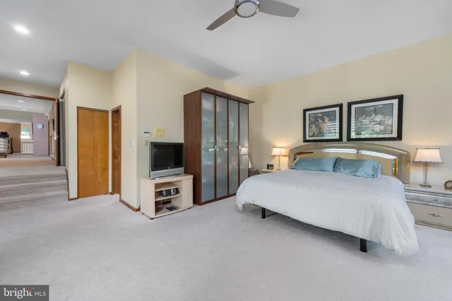 a backyard view with a seating space