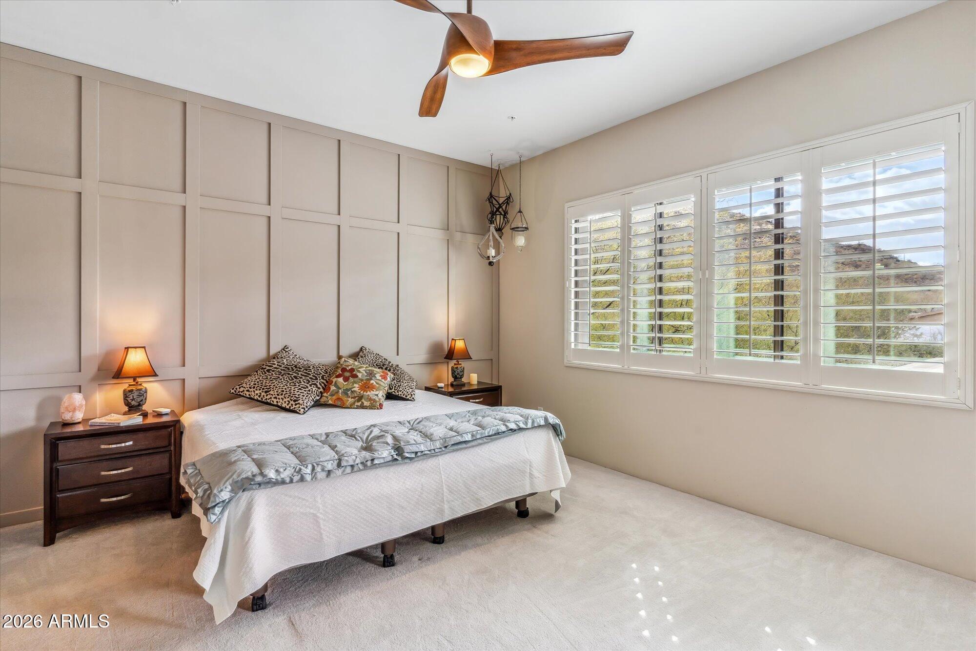 36600 North Cave Creek Road, Unit D11 Cave Creek, AZ 85331 - Photo 14 of 28 a bedroom with a bed and a window