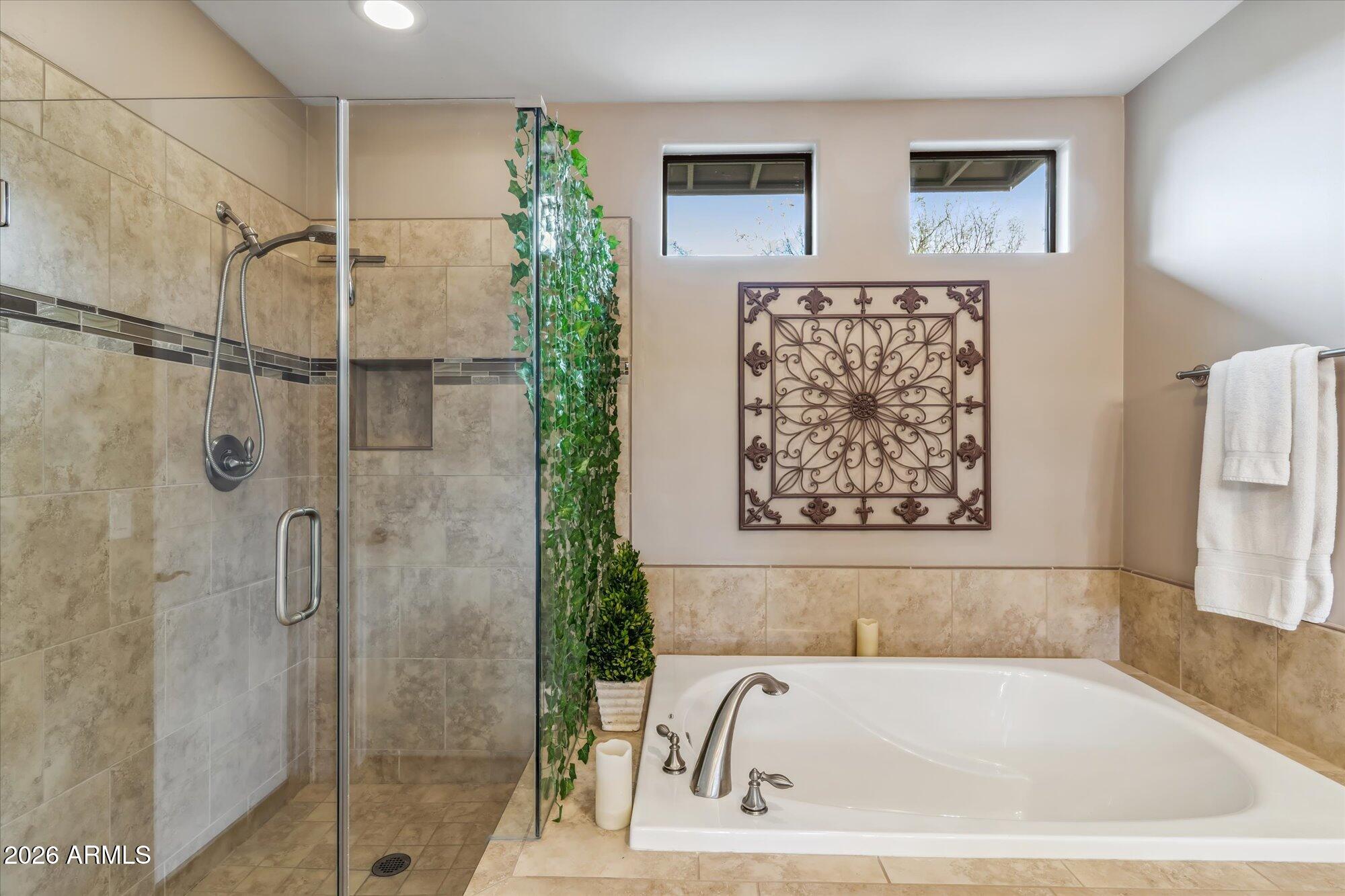 36600 North Cave Creek Road, Unit D11 Cave Creek, AZ 85331 - Photo 18 of 28 a bathroom with a bathtub and a shower