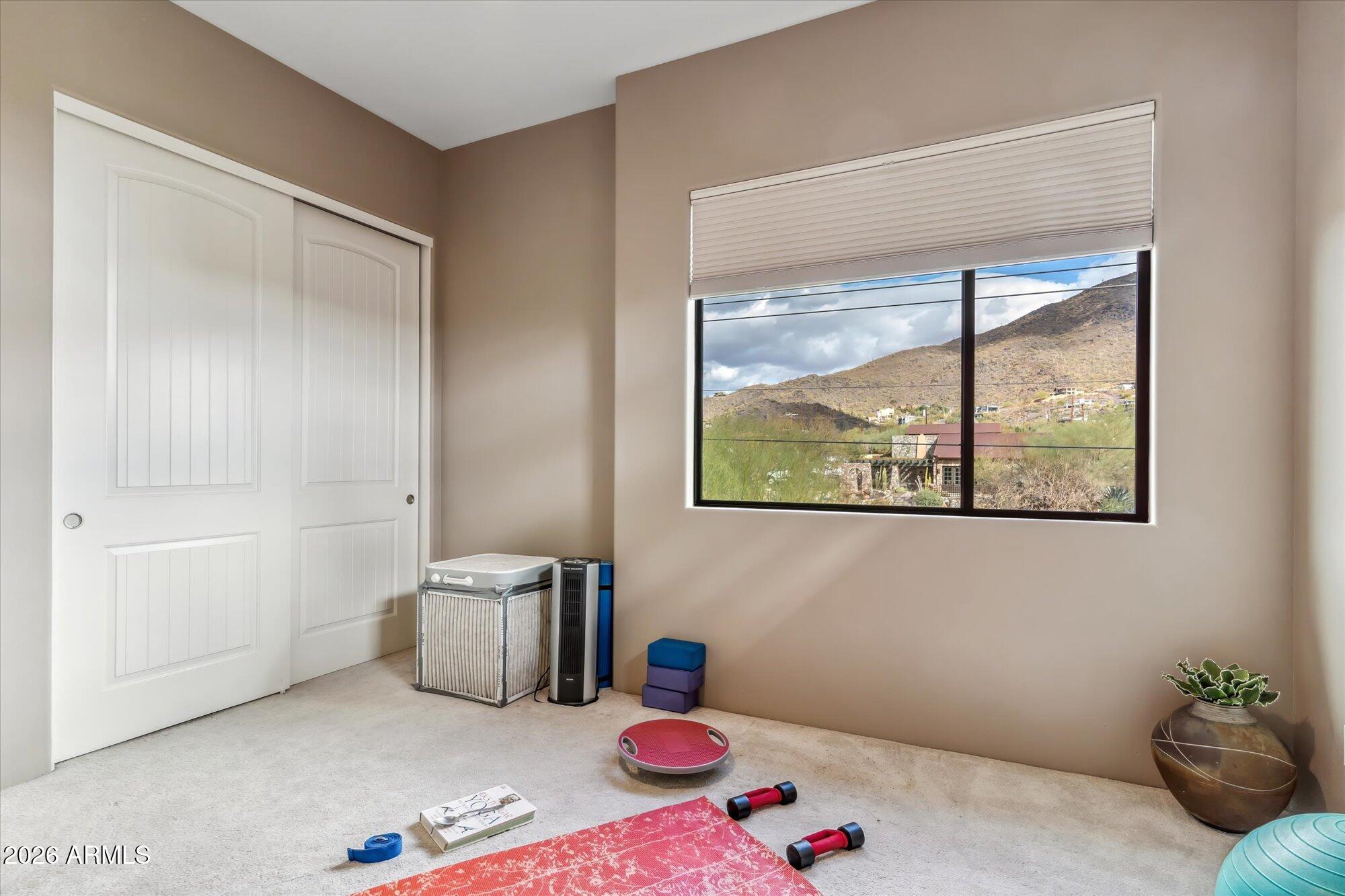 36600 North Cave Creek Road, Unit D11 Cave Creek, AZ 85331 - Photo 20 of 28 a bedroom with a bed and window