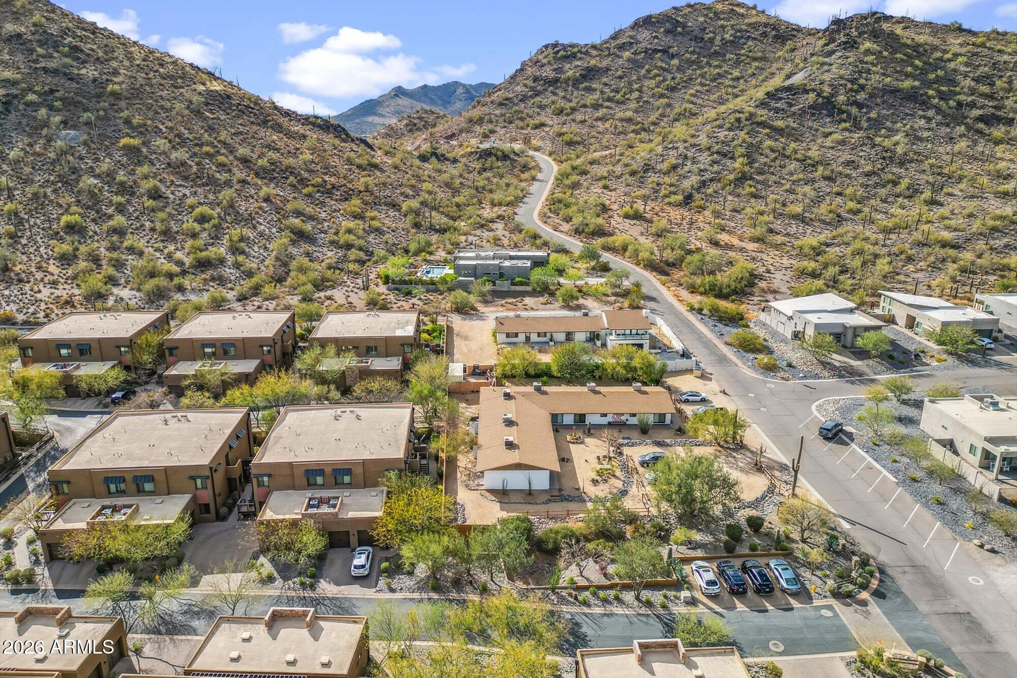 36600 North Cave Creek Road, Unit D11 Cave Creek, AZ 85331 - Photo 2 of 28 an aerial view of residential houses with outdoor space