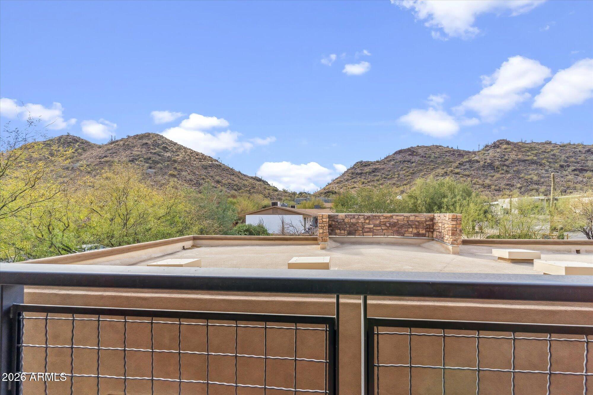 36600 North Cave Creek Road, Unit D11 Cave Creek, AZ 85331 - Photo 25 of 28 a view of a balcony with an outdoor space and lakeside