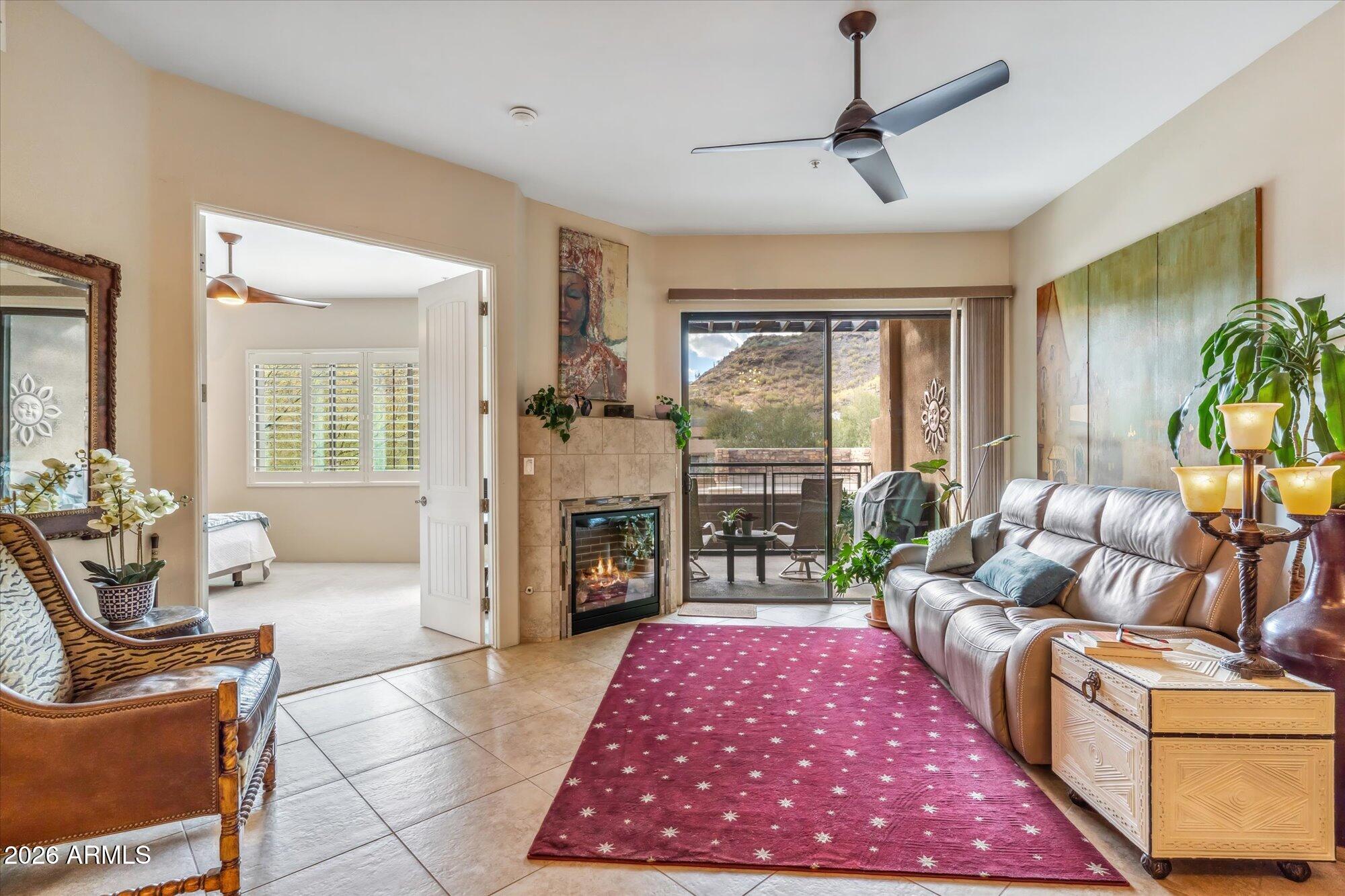36600 North Cave Creek Road, Unit D11 Cave Creek, AZ 85331 - Photo 5 of 28 a living room with furniture and a fireplace