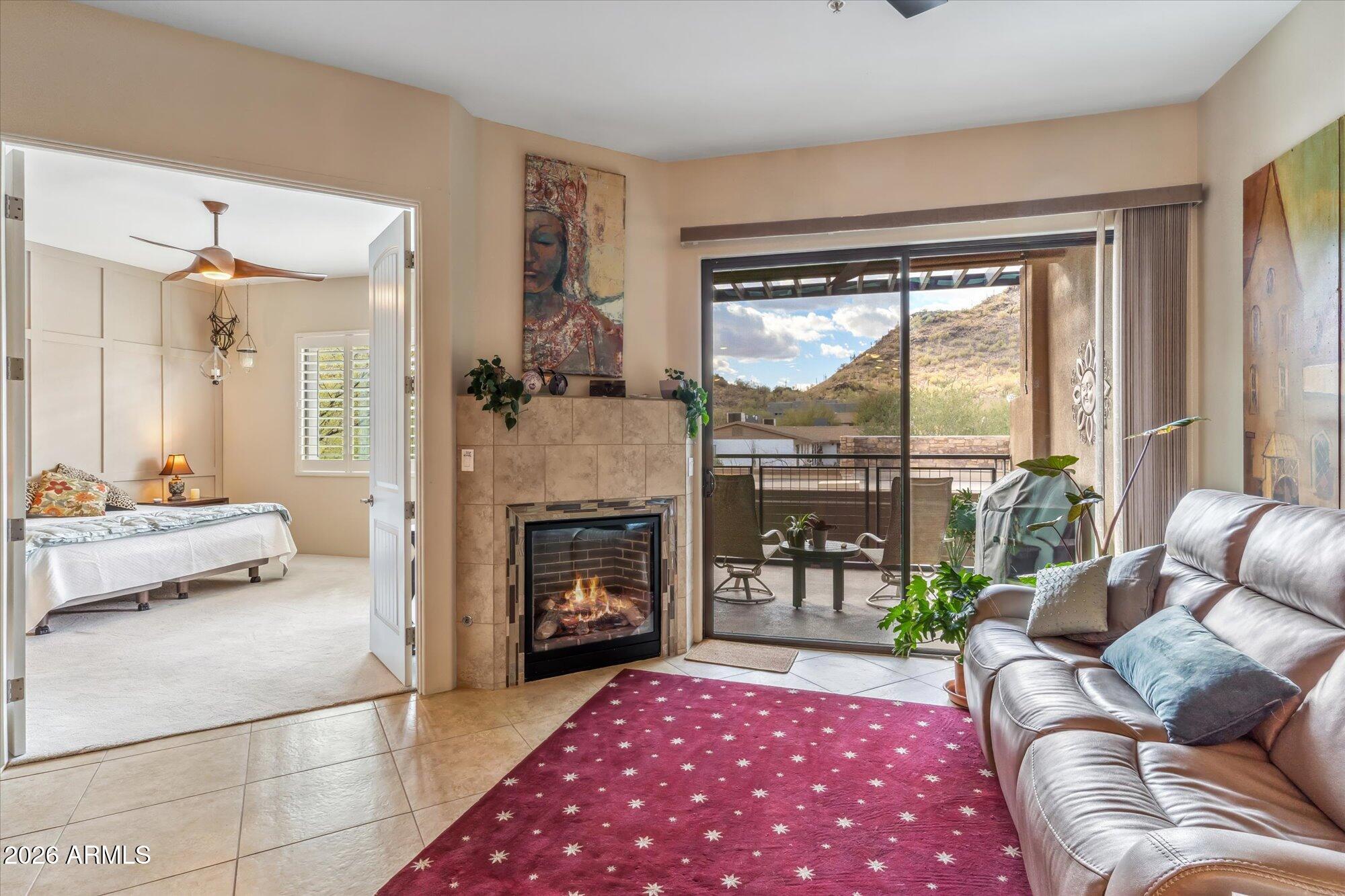 36600 North Cave Creek Road, Unit D11 Cave Creek, AZ 85331 - Photo 6 of 28 a living room with furniture and a fireplace