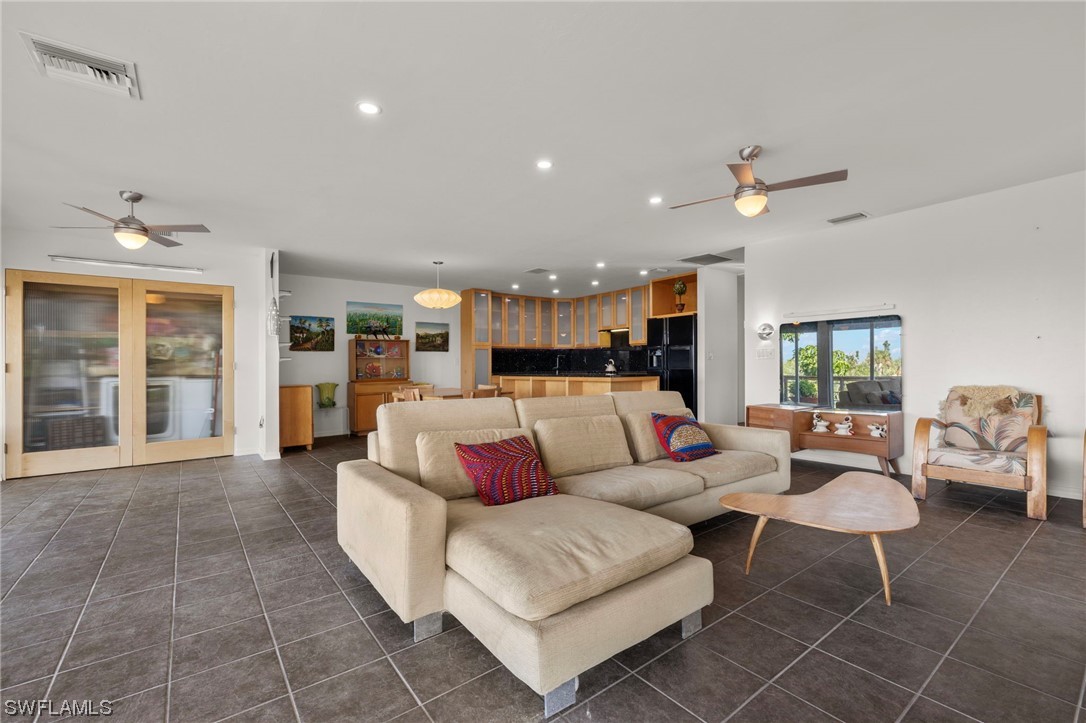 771 Rabbit Road Sanibel, FL 33957 - Photo 3 of 39 a living room with furniture and a large window